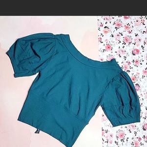 Free People new in used condition with puffer sleeves.  super cute back